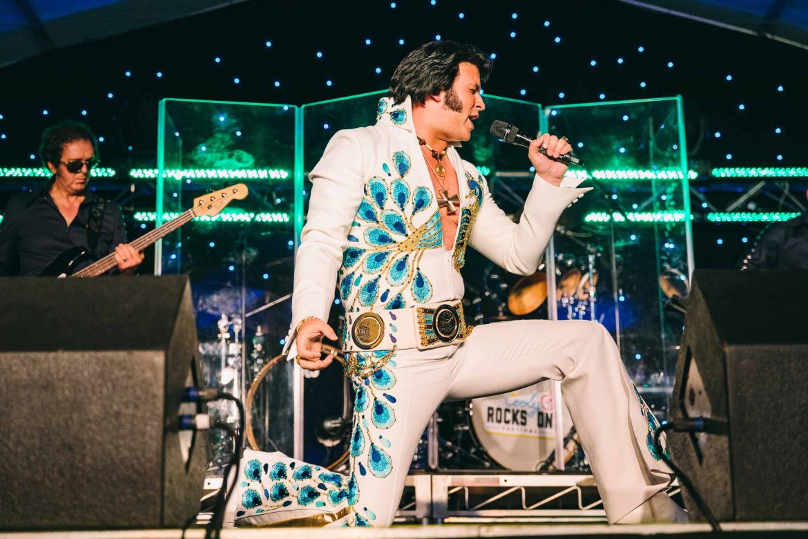 elvis tribute artist performing on stage