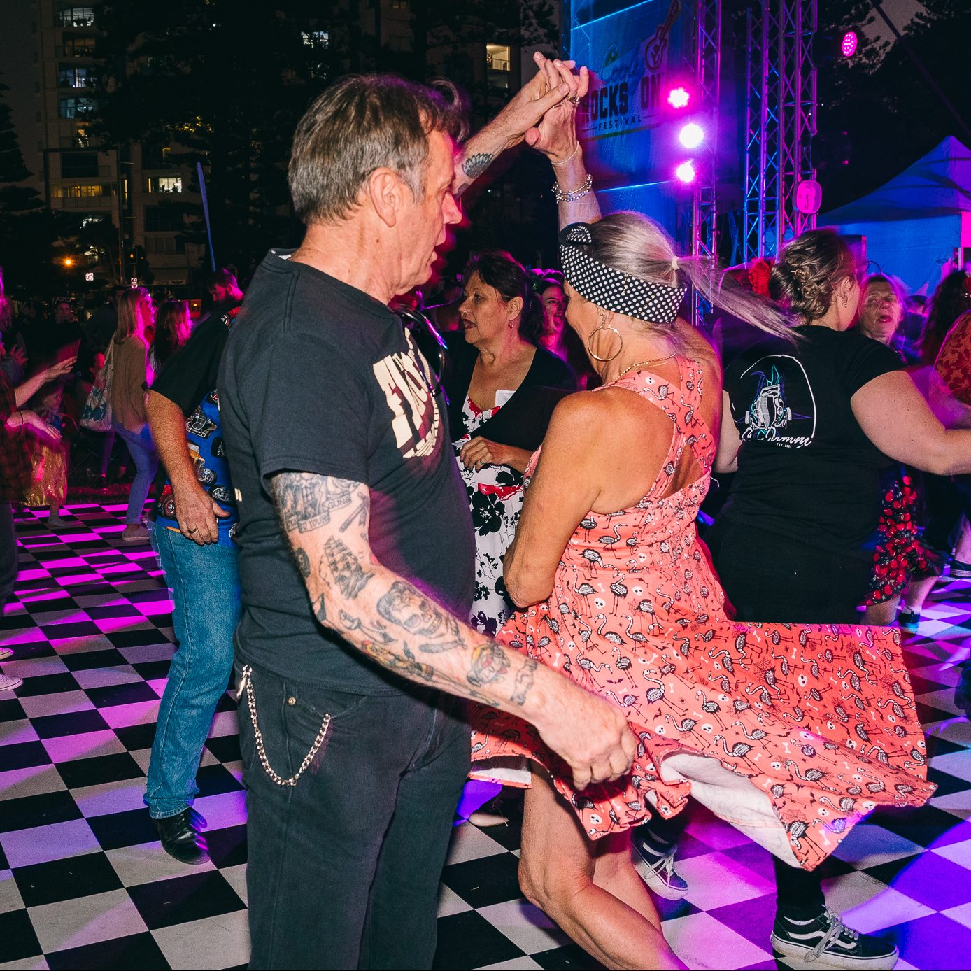two people dancing on the dancefloor